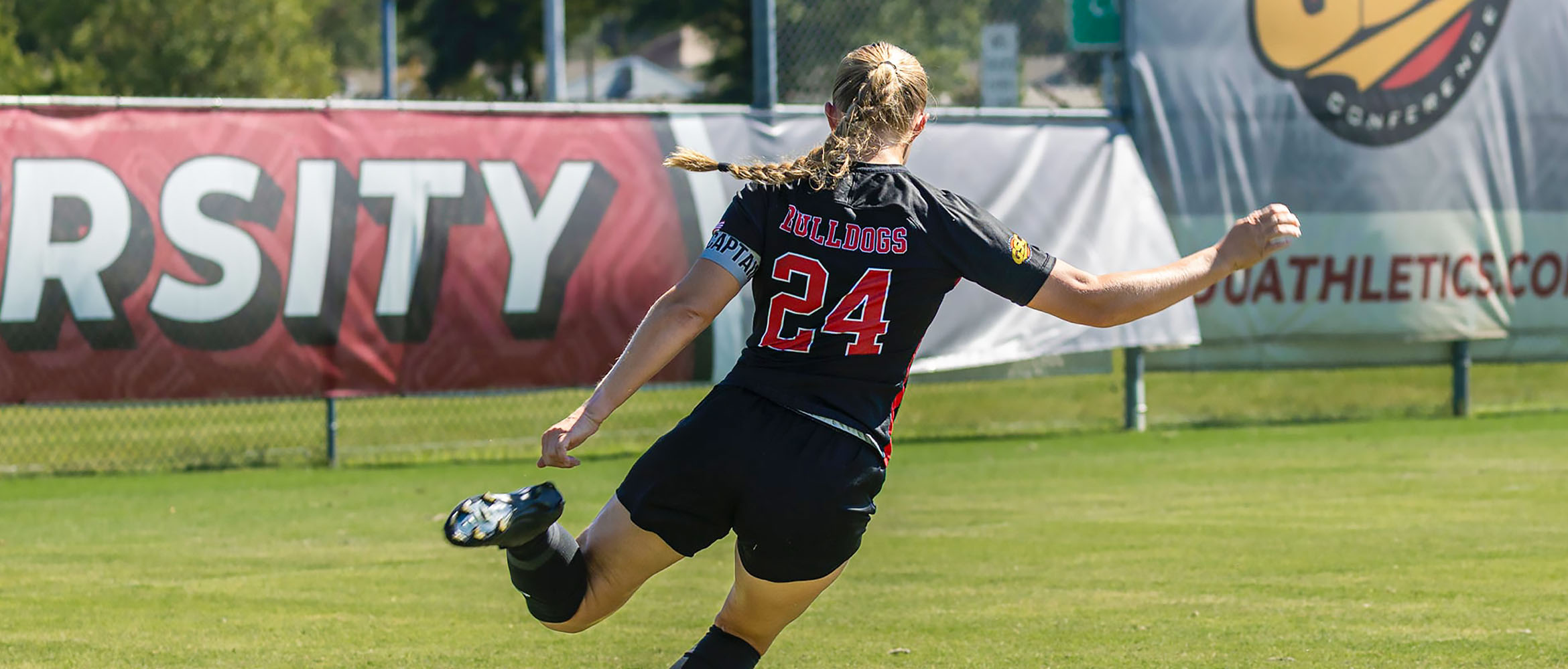 Player kicking the ball